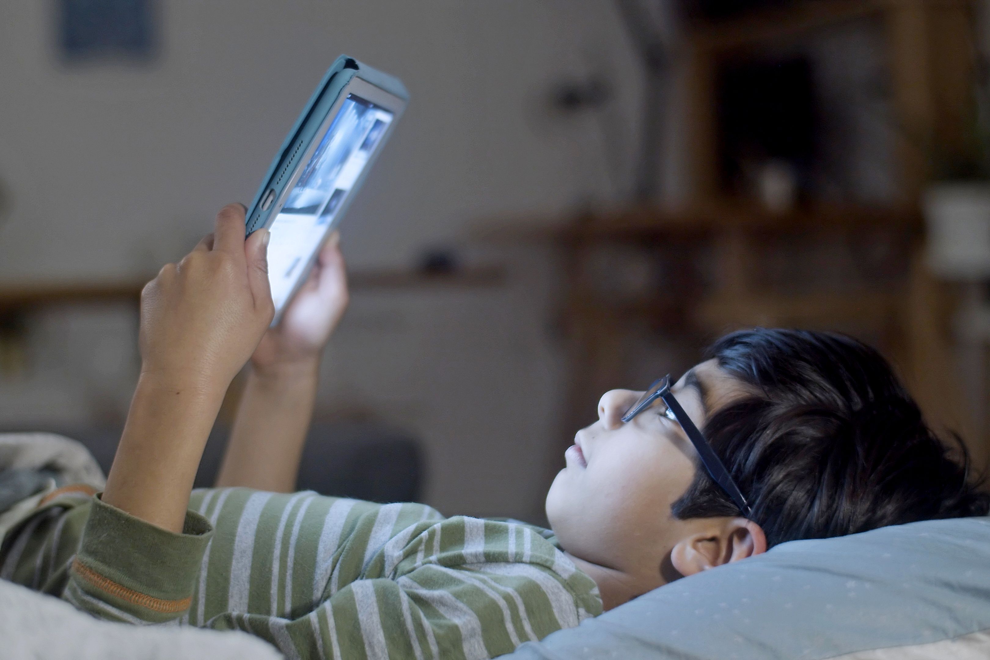 Children and youth in front of screens